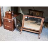 Two 19th century mahogany dressing table mirrors, a mahogany shield framed mirror, George III