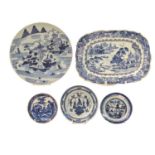 An early 19th century Chinese blue and white rectangular dish painted with a typical landscape,