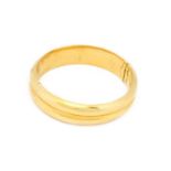 A hinged bangle, formed of two yellow plain polished rows, inner measurements 6.2cm by 5.8cm; and an