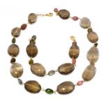 An 18 carat gold quartz and multi-gem set bead necklace, faceted irregular shaped smoky quartz beads