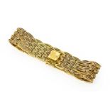 A 9 carat gold fancy link bracelet, formed of yellow plain polished torpedo-shaped openwork links,