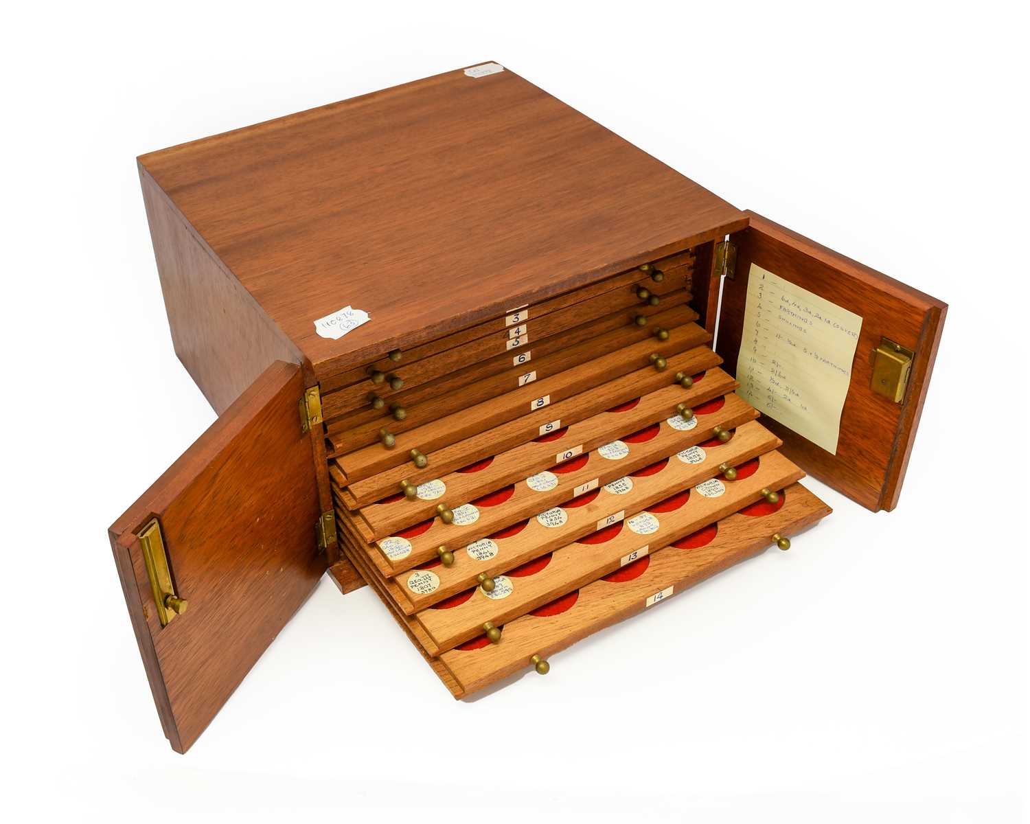 A Professionally Made Wooden Coin Cabinet, 29cm x 30cm x 17cm (11½” x 11¾” x 6¾“ ) containing 14