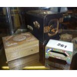 Black lacquered Japanese box with gilt mounts, Chinese brass box and an enamelled matchbox case