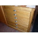 Light oak secretaire chest of five drawers with cup handles