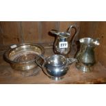 Sheffield plate wine coaster, two silver plated cream jugs and a tankard