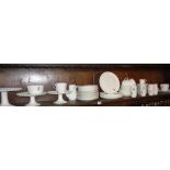 Large service of Royal Naval Officer's mess white china, inc. coffee cups, comports and plates by