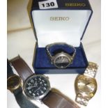 Four wrist watches, one Seiko Titanium in case, another vintage Seiko Automatic, a vintage Alpha,