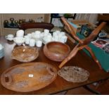 Three carved wooden fruit bowls, an oval carved wooden tray and a carved wood intertwined folding