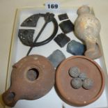 Antiquity earthenware lamp, large Celtic style brooch, musket balls, worked flint pieces, etc.