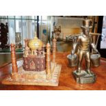 Metal Hummel figure and a carved wooden Taj Mahal