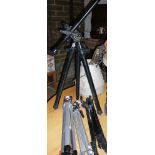 A Benbo camera tripod and three others