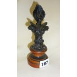 Spelter bust of girl in a bonnet on mahogany stand (A/F)