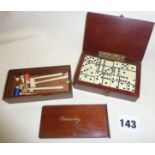 Antique miniature ivory table croquet set in mahogany box with sliding lid, and a set of miniature