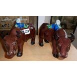 Pair of Chinese figures of boys on buffaloes