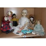 Group of seven assorted old dolls and a Die-cast Chevrolet Corvette car