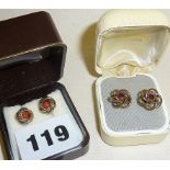 Two pairs of 9ct gold earrings set with coral and ruby