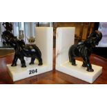 Pair of Art Deco style marble bookends with mounted elephants