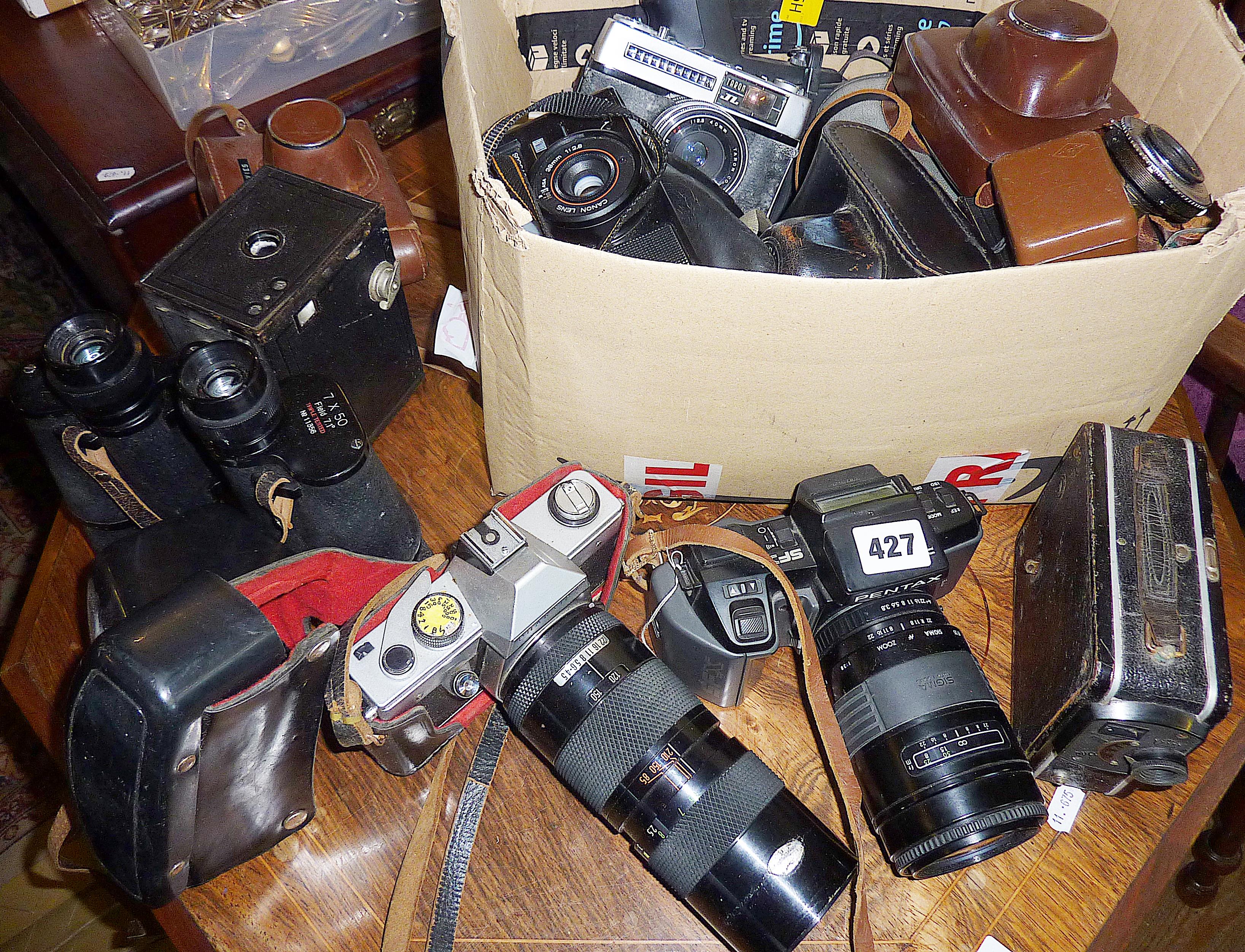 Collection of assorted cameras and binoculars, inc. Pentax, Canon, Kodak, etc.