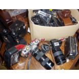 Collection of assorted cameras and binoculars, inc. Pentax, Canon, Kodak, etc.