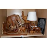 Herd of carved hardwood elephants and ornaments