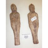 Antiquarian papier mache fertility figures of a man and a woman