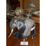 Indian 19th c. carved ebony elephant mounted with silver decoration
