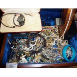 Large box containing vintage costume jewellery - some cased
