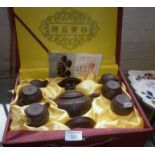 Chinese Yixing tea set of teapot, 6 cups and saucers, boxed with COA