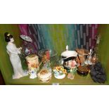 Shelf of assorted china ornaments