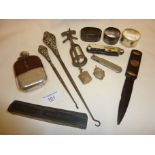 Hallmarked silver napkin rings, button hooks, fob medal, together with a corkscrew, hip flask,