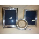 Three silver photo frames