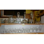 Three various cut glass decanters, five sets of assorted wine glasses and other glassware