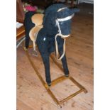 A large Mamas & Papas Rocking Horse