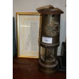 Brass miner's type lamp by Thomas & Williams Ltd., (COA in frame)