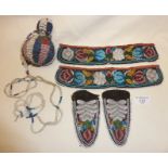Late 19th c. Iroquis Native American beadwork moccasin side panels and other pieces. Also