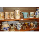 Collection of assorted brewery water jugs and other pottery jugs and mugs