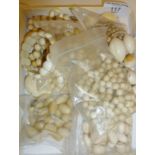 Antique ivory bead necklaces and loose beads