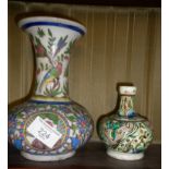 Iznik pottery vase with birds and portraits decoration and a smaller similar (restored)