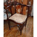 Edwardian mahogany corner chair with shape and carved back