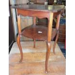 Edwardian mahogany two-tier occasional table on elongated cabriole legs