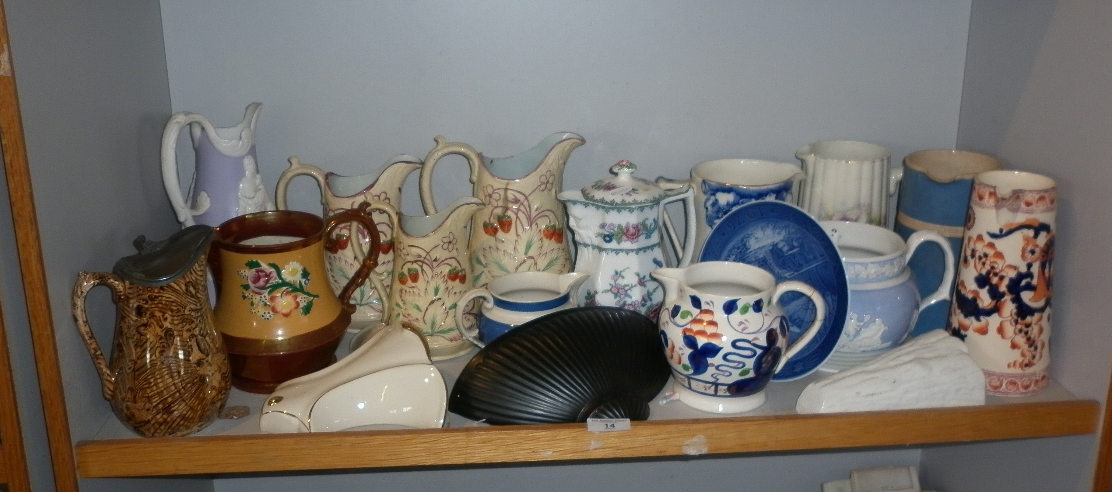 Assorted china and pottery jugs