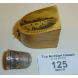 Mauchline Ware thimble holder for East Beach, Felixstowe, with silver thimble, hallmarked for