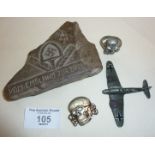 Possible WW2 German POW carved stone, an SS cap badge, etc.
