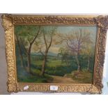 Gilt framed oil on canvas of landscape with trees by W.E. Turner