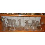 Assorted glass decanters and jars