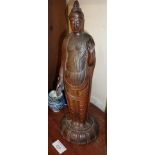 A large Japanese terracotta figure of the goddess 'Kannon', signed, 36cm