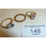 Three 9ct gold rings (one with missing stone), approx 6g