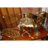 Two Victorian brass trivets, a companion set, coal scuttle, etc.