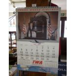 A 1953 TWA airlines calendar and a 1963 Daily Herald for November 23rd with Kennedy's
