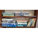 Two shelves of good books on aviation and aeroplanes, inc. Janes American Fighting Aircraft and 24